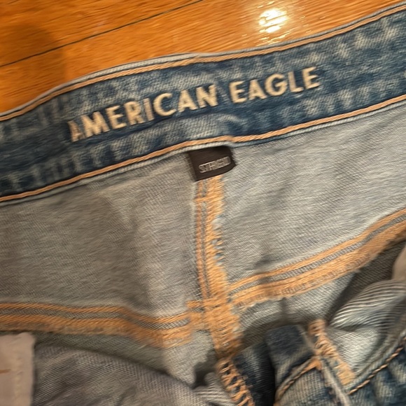 American Eagle Strigid Ripped Mom Jeans in Medium Wash - Picture 4 of 10
